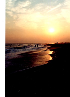 My-photo-of-a-beautiful-golden-sunset--with-people-strolling-the-shore-line--in-Long-Beach--Long-Island--New-York"