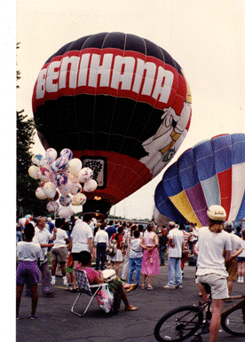 my-photo-of-hot-air-balloons-being-inflated--a-bicycle-is-in-the-foreground--and-a-thin-crowd-of-unknown-spectators-walking-around--all-taking-place-in-front-of-the-philadelphia-art-museum"